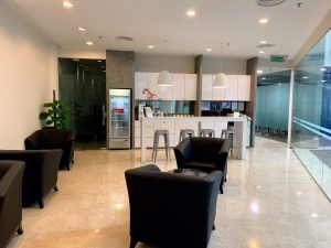 business lounge with kitchen amenities