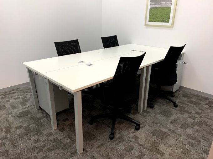 office space with tables and chairs
